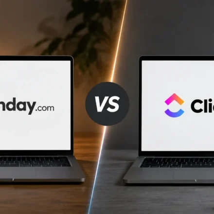 Two open laptops facing each other on a desk split into warm and cool halves, the left screen showing the monday.com logo and the right screen showing the ClickUp logo, separated by a VS badge.